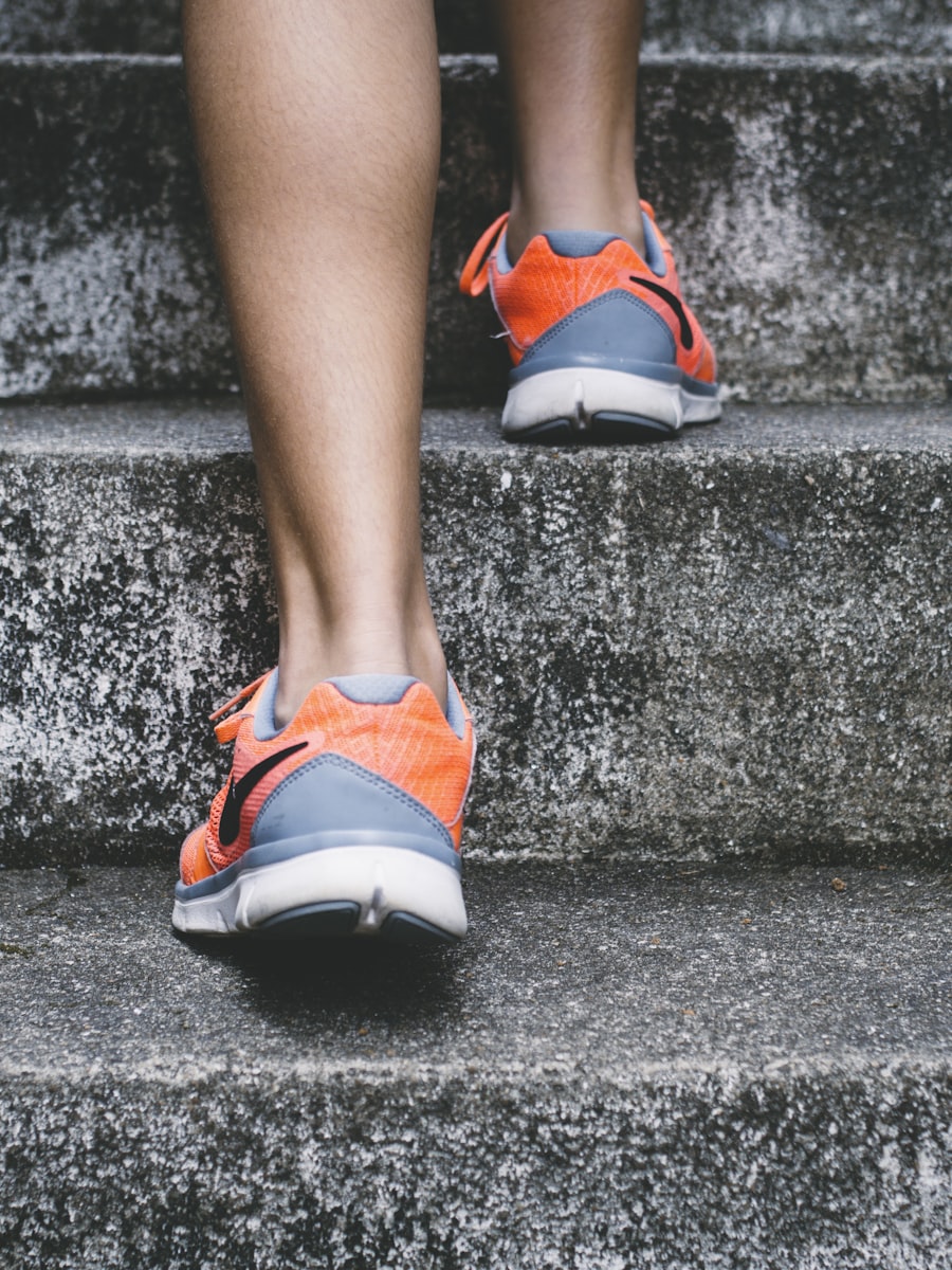 A runner climbing stone steps